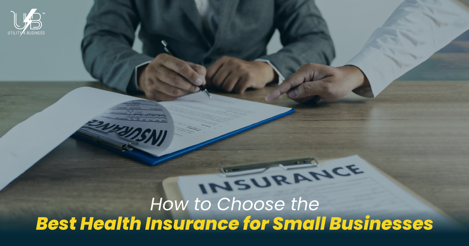 Best Health Insurance for Small Businesses, two colleagues reviewing insurance documents and signing the plan.